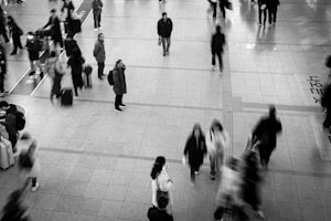 Commuters in motion through a busy station
